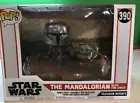 Funko POP! Deluxe Star Wars The Mandalorian with the Child 390