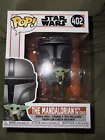 Funko Pop! Vinyl: Star Wars - The Mandalorian with the Child #402